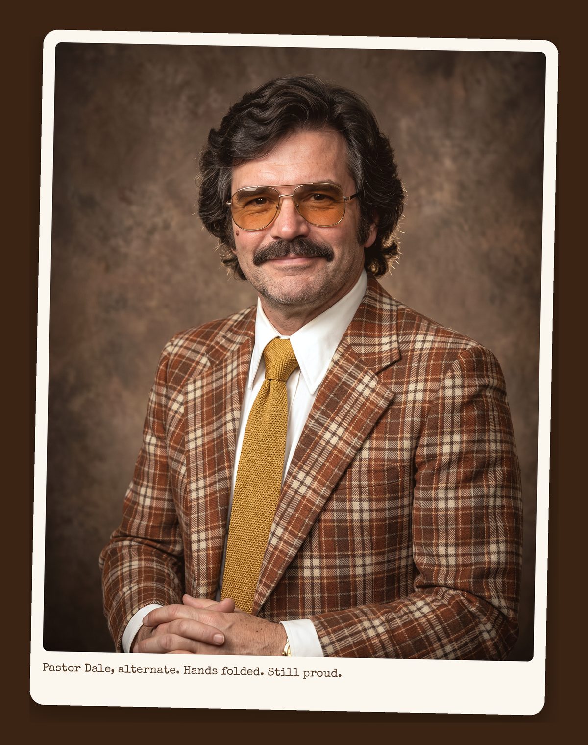 Pastor Dale Honeycutt, smiling, in a brown plaid sport coat, white shirt, and mustard knit tie, with amber aviator glasses and a full mustache, photographed against a mottled brown church-directory backdrop.